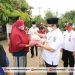 Pj. Bupati Bolsel Serahkan Bantuan Sembako Warga Pinteng