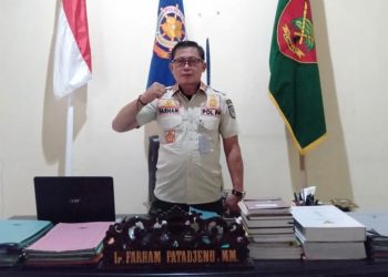Peringati HUT Pol PP Dan Linmas, Satpol PP Bolmut Bersih-Bersih Kawasan Wisata Batu Pinagut