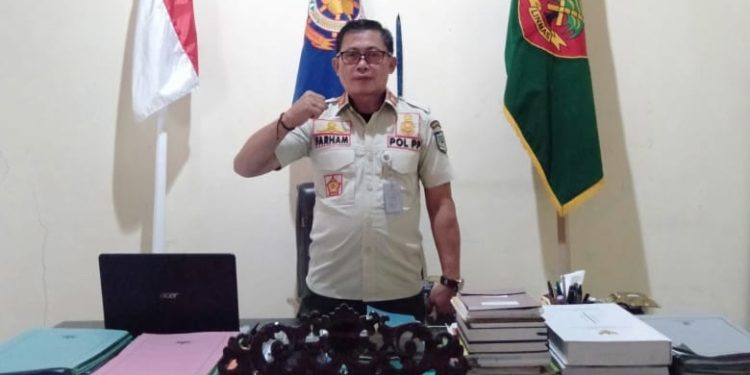 Peringati HUT Pol PP Dan Linmas, Satpol PP Bolmut Bersih-Bersih Kawasan Wisata Batu Pinagut