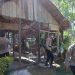 Polres Bolmut Saat Bedah Rumah Warga Desa Bolangitang Induk (Foto/Ist)