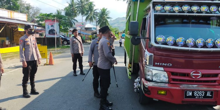 Kolaborasi Kapolres Bolmut dan Gorut Antisipasi PMK di Perbatasan