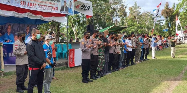 Di KNPI Cup, Kapolres Bolmut Doa Bersama Untuk Korban Kanjuruhan