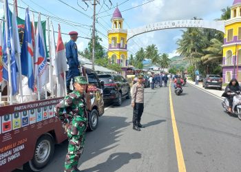 Polsek Pinogaluman Kawal Rombongan Kirab Pemilu 2024 Hingga di Perbatasan Sulut dan Gorontalo 
