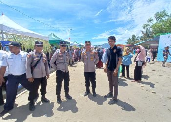 Polsek Pinogaluman Amankan Ketupat Fair di Pantai Buko