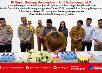 Pemkab Bolmong Teken NPHD Pilkada 2024