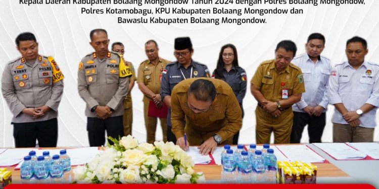 Pemkab Bolmong Teken NPHD Pilkada 2024