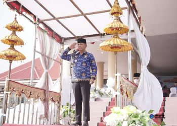 Pj Bupati Bolmong Irup Upacara Peringatan Hari Korpri Dirangkai Hari Koperasi dan Hari Anak