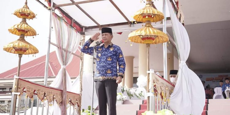 Pj Bupati Bolmong Irup Upacara Peringatan Hari Korpri Dirangkai Hari Koperasi dan Hari Anak