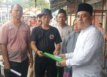 Bupati Bolmong Kunjungi Korban Kebakaran, Serahkan Dokumen Kependudukan