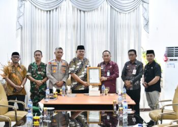 Pemkab Boltim Terima Kunjungan Kanwil Kemenkum Sulut, Serahkan KIK Budaya Kabela dan Perkuat Posbankum