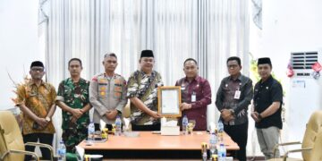 Pemkab Boltim Terima Kunjungan Kanwil Kemenkum Sulut, Serahkan KIK Budaya Kabela dan Perkuat Posbankum