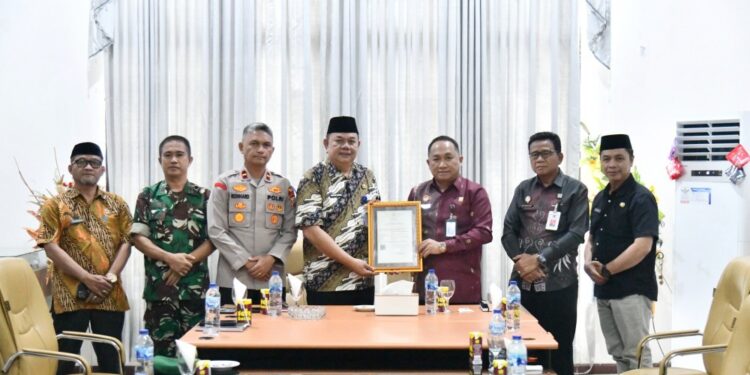 Pemkab Boltim Terima Kunjungan Kanwil Kemenkum Sulut, Serahkan KIK Budaya Kabela dan Perkuat Posbankum